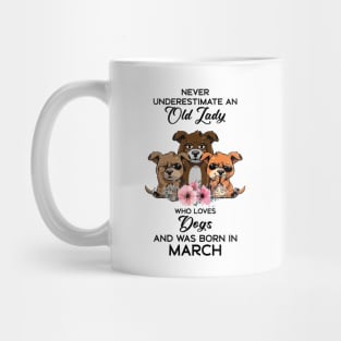 Never Underestimate An Old Woman Who Loves Dogs And Was Born In March Mug